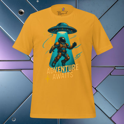 Yellow t-shirt with an astronaut and UFO graphic and 'Adventure Awaits' text on a colorful geometric background.